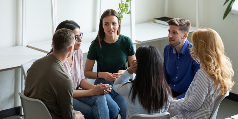 A group of people in earnest discussion